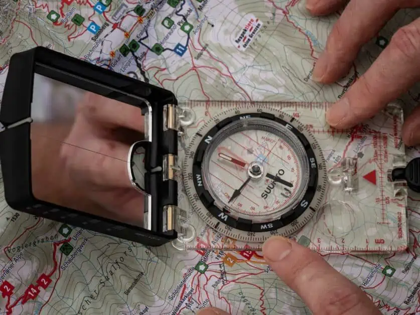 Suunto MC-2 hiking compass on map